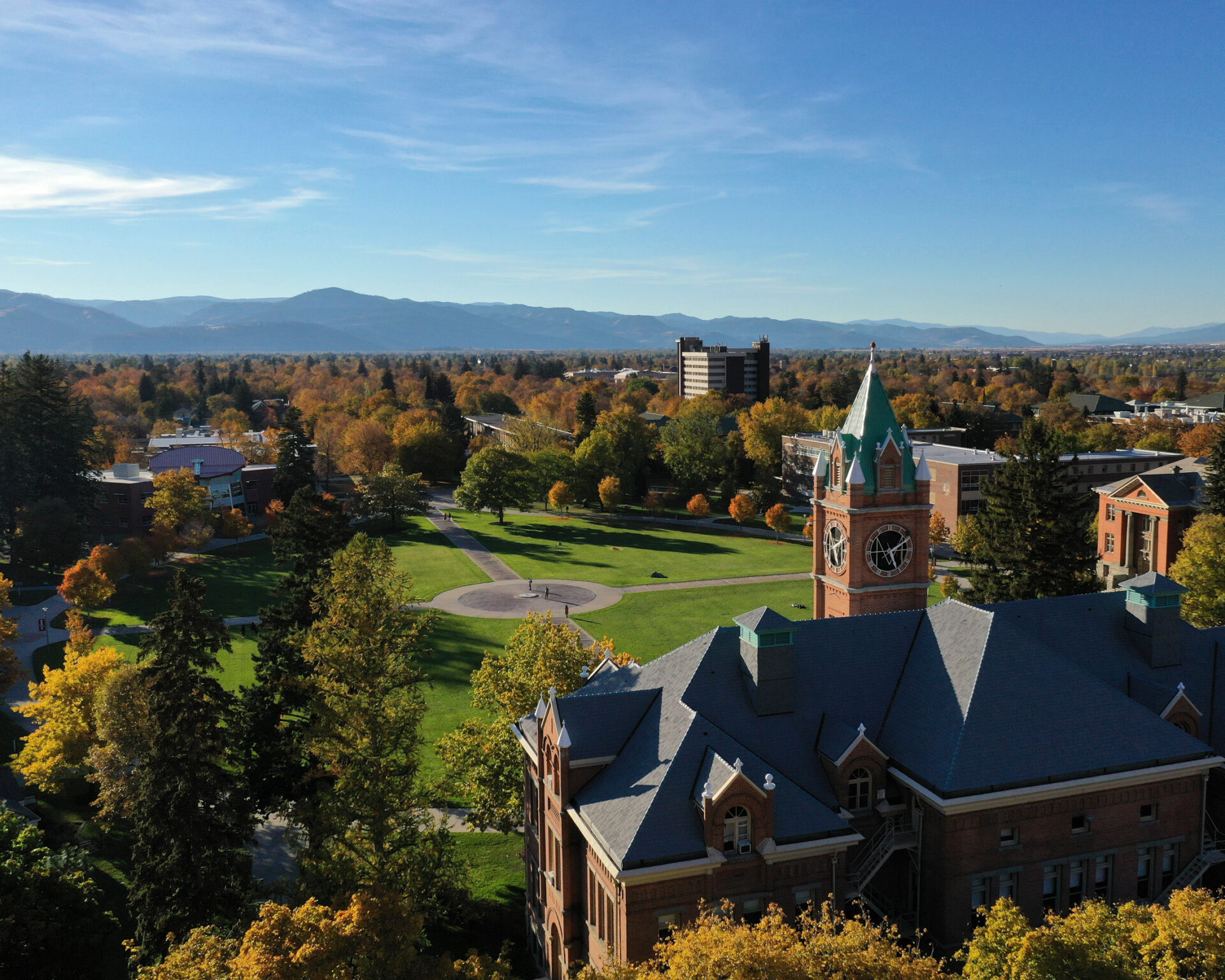 University of Montana campus with Main Hall and scenic fall foliage in Missoula