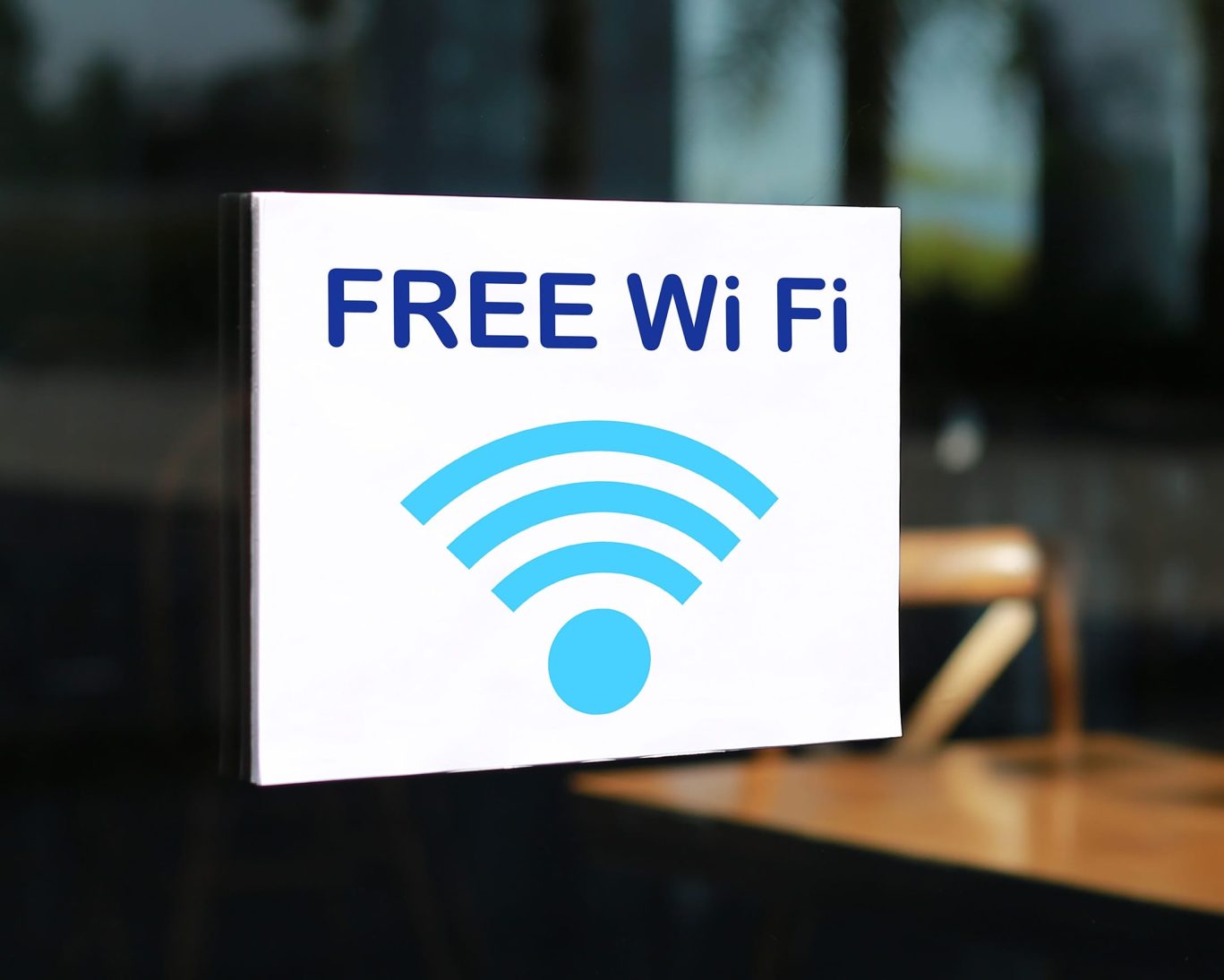 Free Wi-Fi sign at Budget Host East End hotel entrance