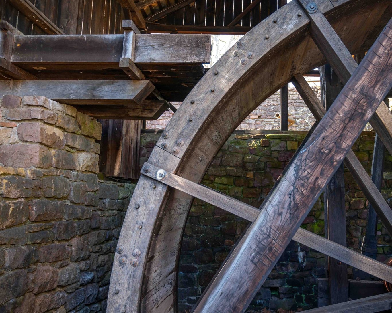 Restored water wheel at Old Bedford Village, a historic attraction near Judy's Motel in Bedford PA.