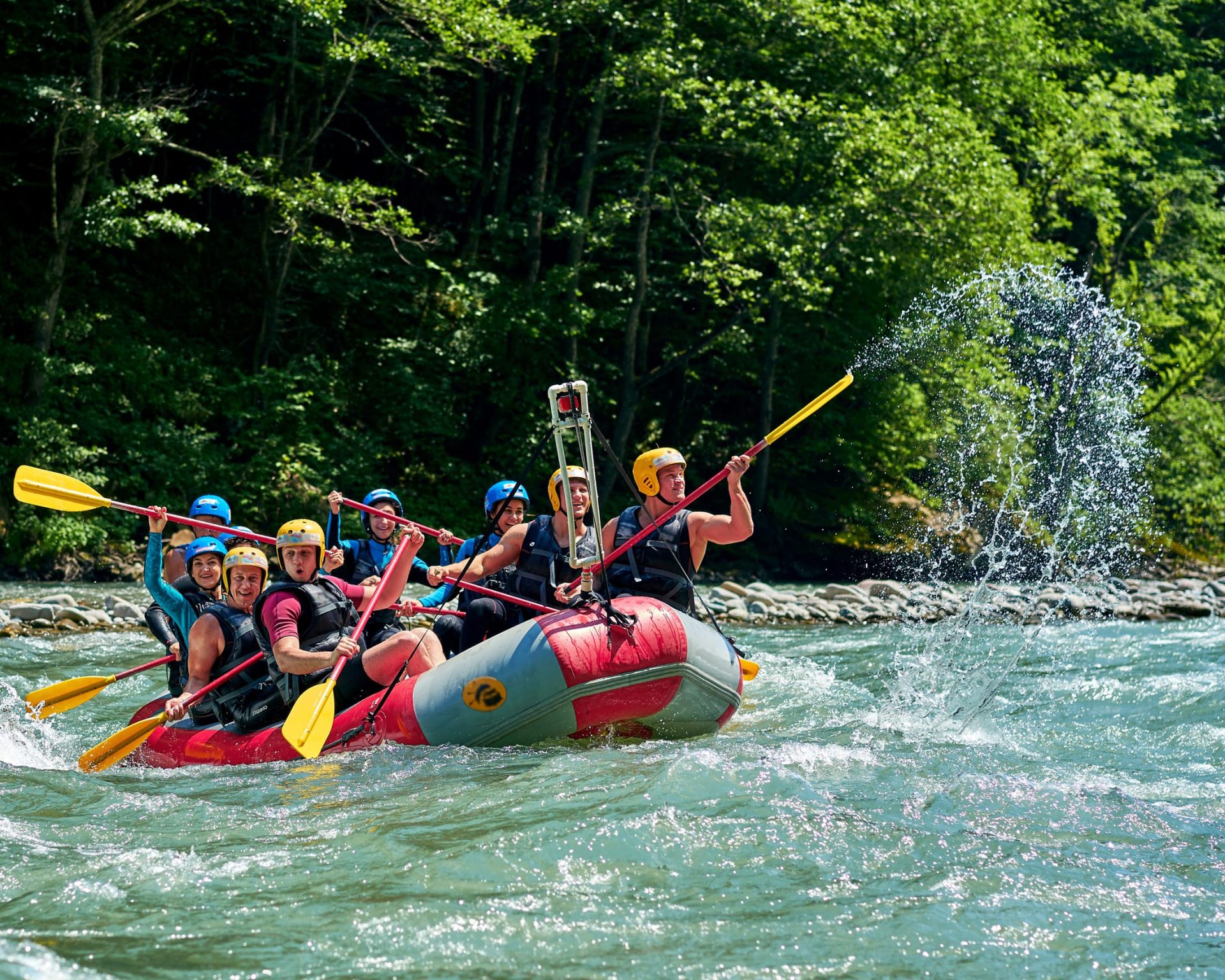 Group whitewater rafting on the Hudson River near Lake Luzerne in the Adirondacks.