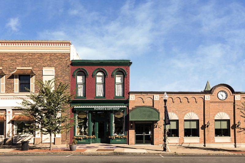 Charming historic main street with small-town storefronts in Michigan.