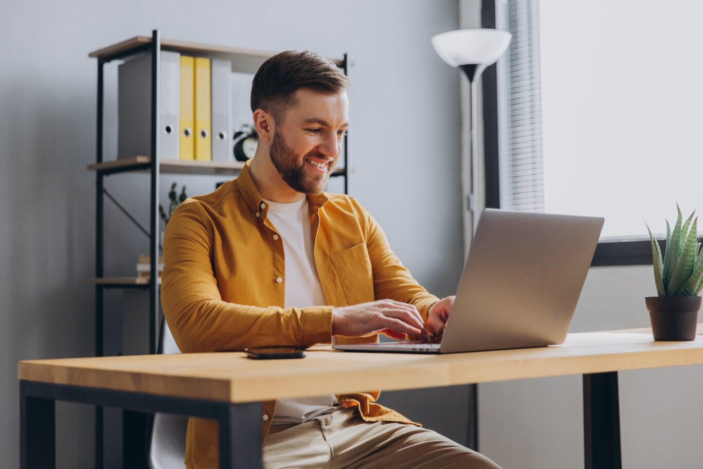 Portrait,Of,A,Modern,Businessman,Man,In,A,Yellow,Shirt