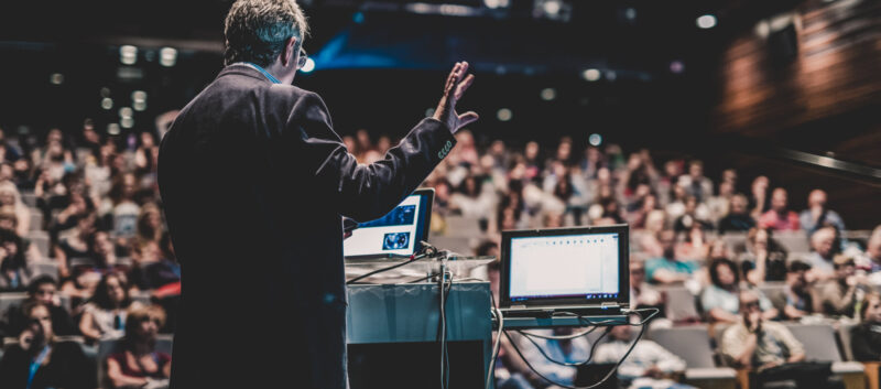 lecturer talking to students